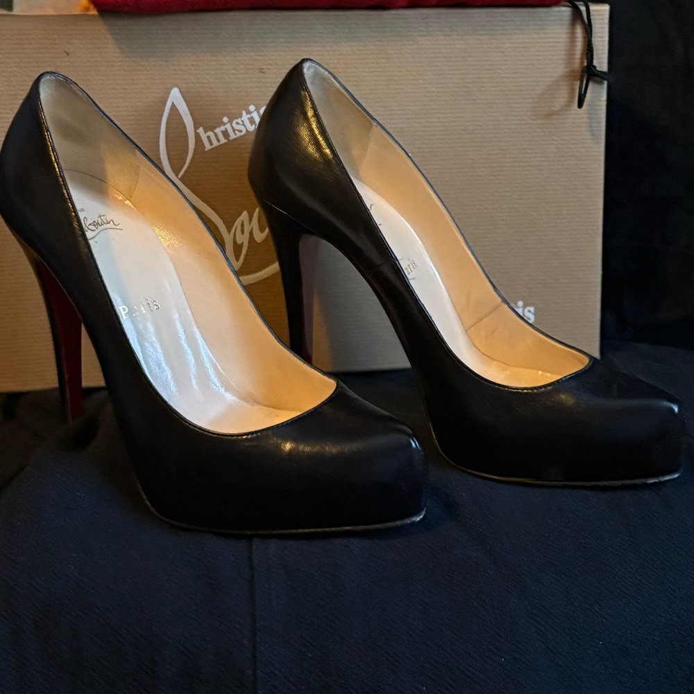 Christian Louboutin size 7 
with dust bag
extra tips
and box